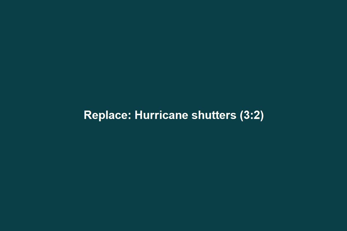 Florida home with hurricane shutters partially closed and palm trees in foreground